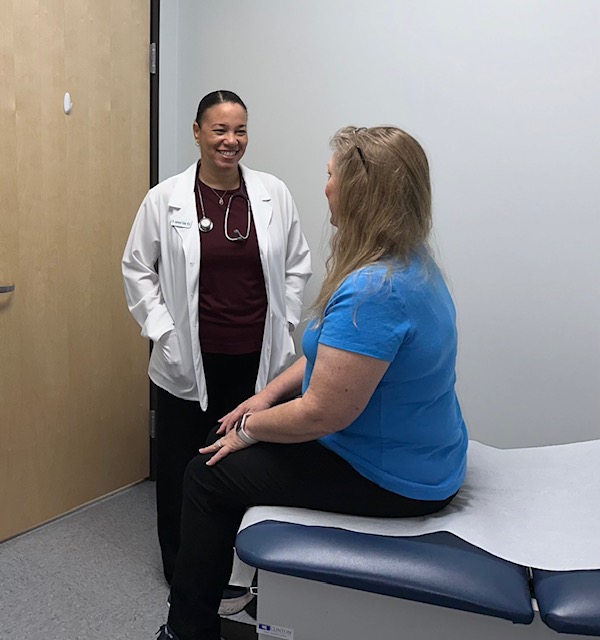 Dr. Talley meeting with a patient in her North Las Vegas exam room