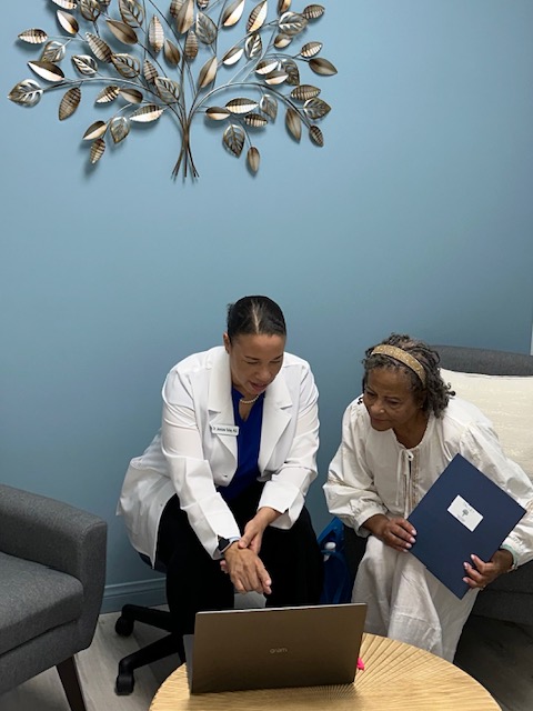 Dr. Talley reviewing health information with a patient in her North Las Vegas office